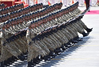 國防部回應“解放軍多年未實戰‘尚能飯否’”